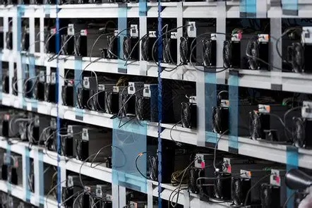 Inside a high-tech mining farm with rows of mining machines