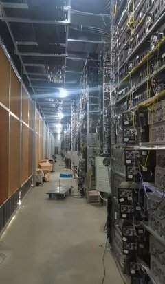 A mining farm powered by solar panels showing the scale of equipment needed for energy efficient mining.