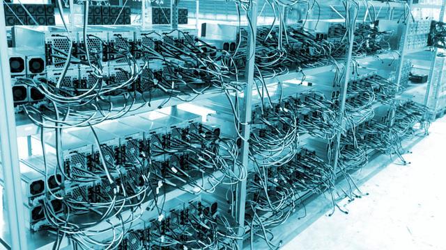 A powerful mining rig with multiple GPUs working to solve Bitcoin blocks